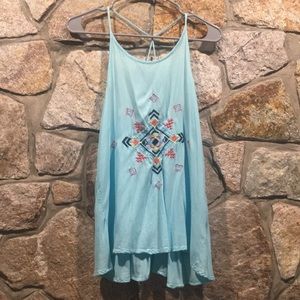 Cute turquoise summer tank with open back!